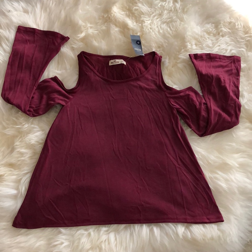 Cold shoulder bell sleeve top